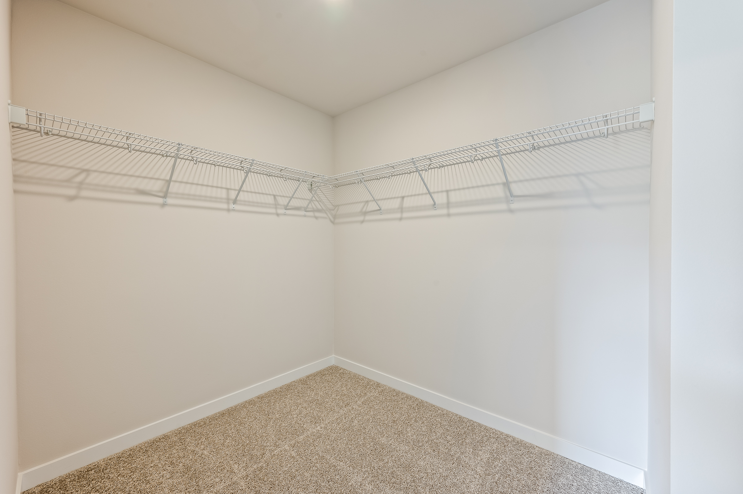 A white room with a white wall.