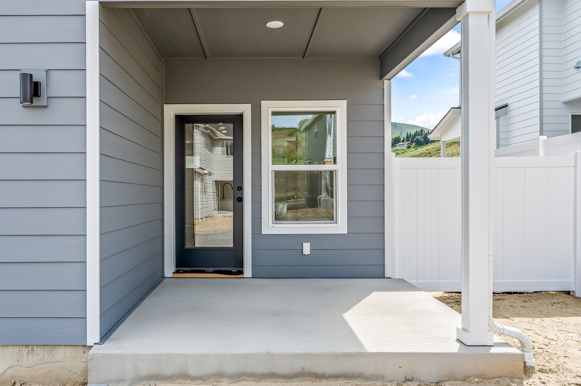 A house with a white fence.
