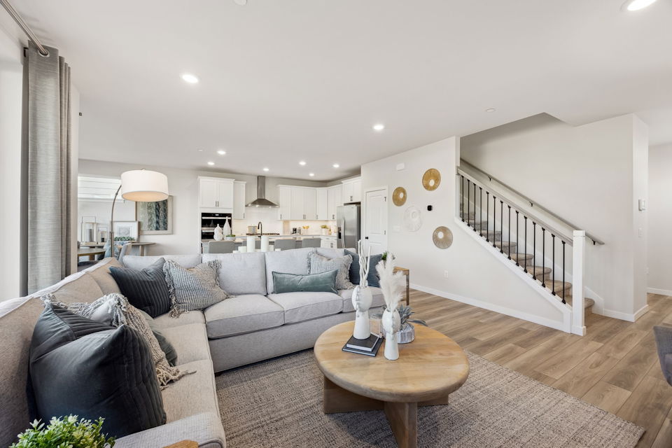 A living room with a couch and a coffee table.