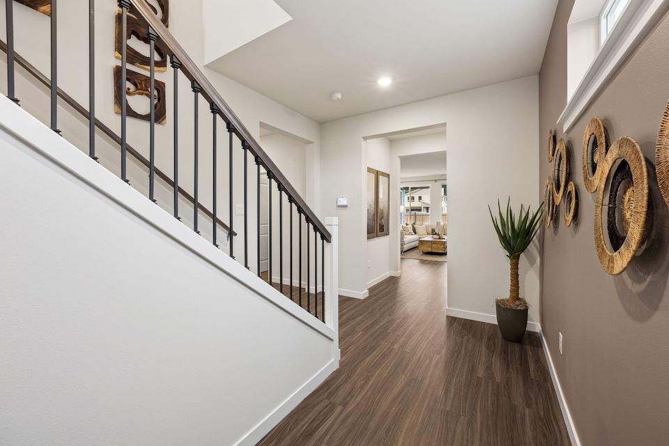 A hallway with white walls.