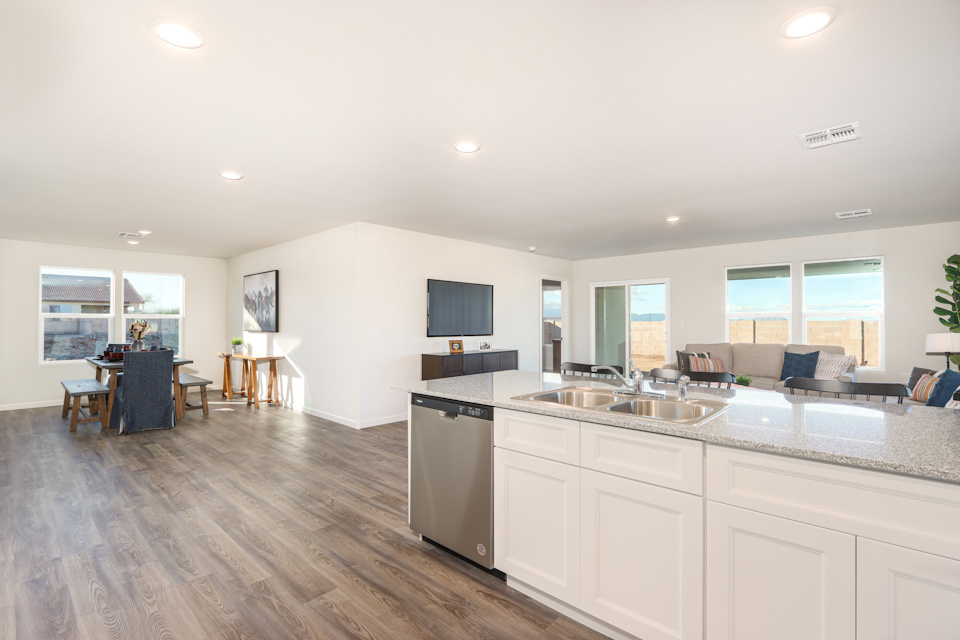 A large kitchen with white cabinets.