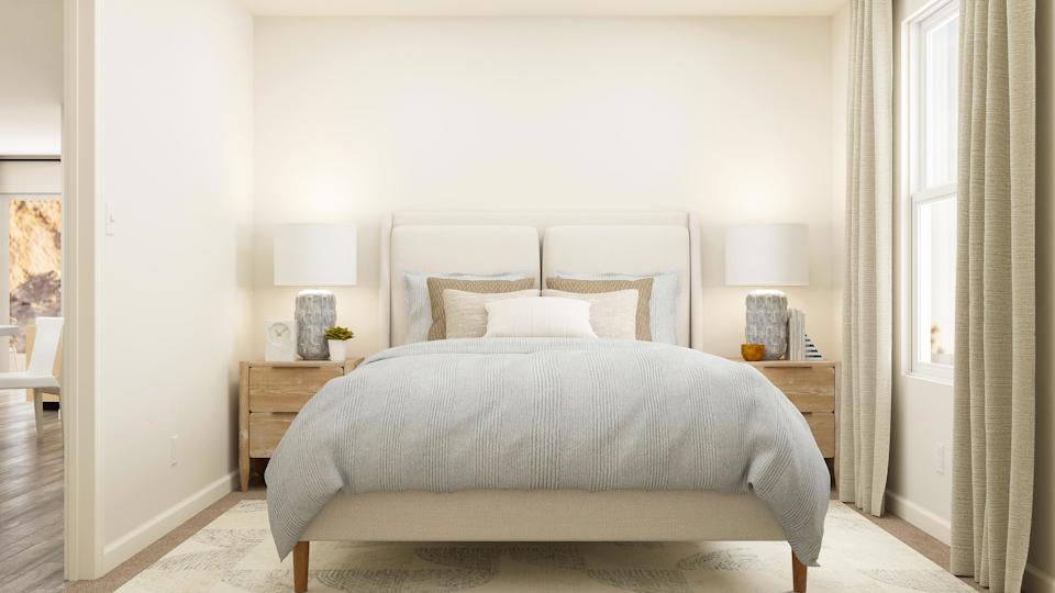 A bed in a room.