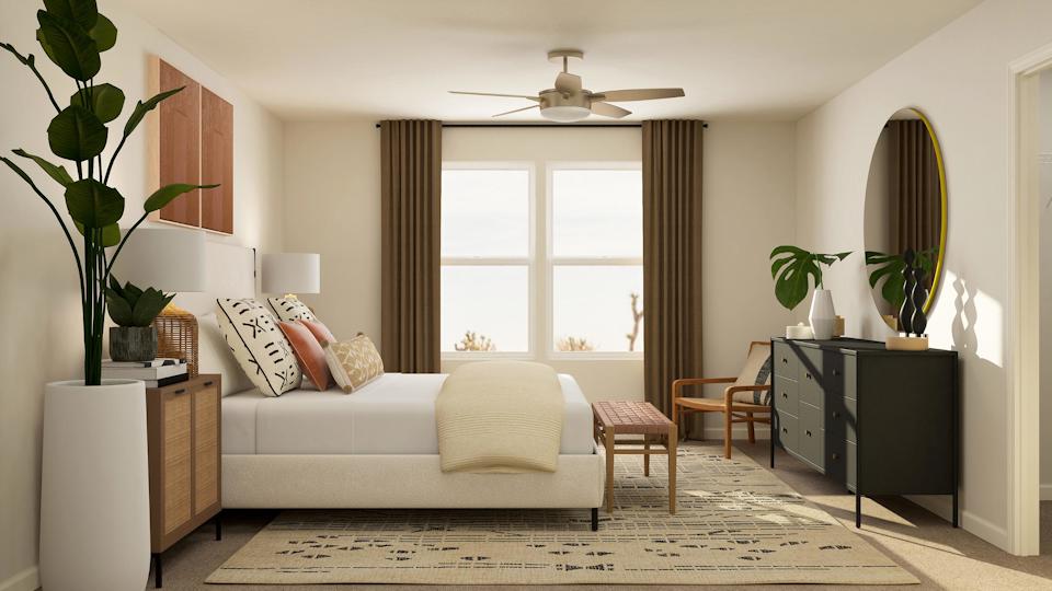 A living room with a couch and a table.