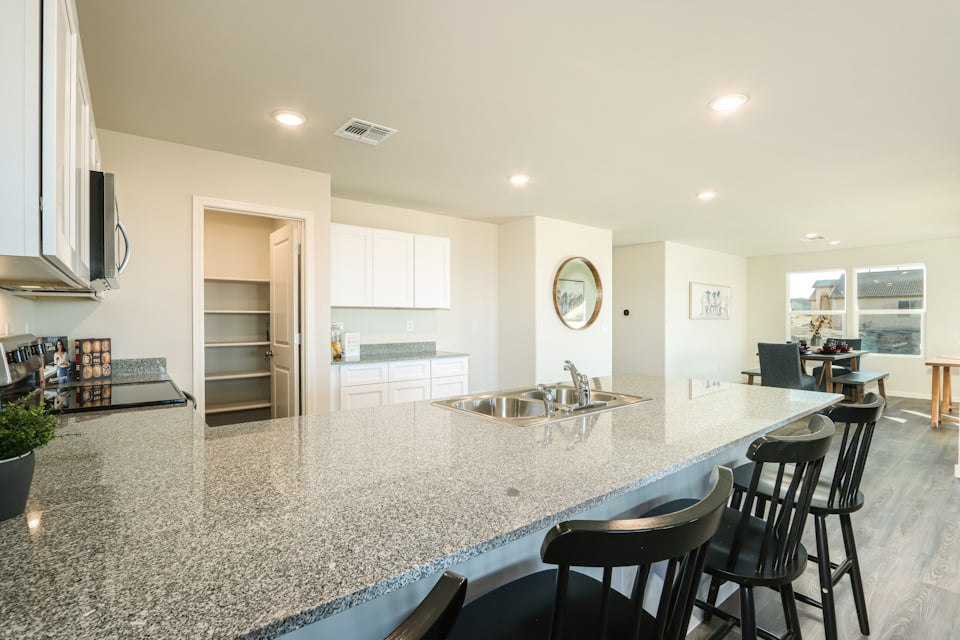 A kitchen with a large island.
