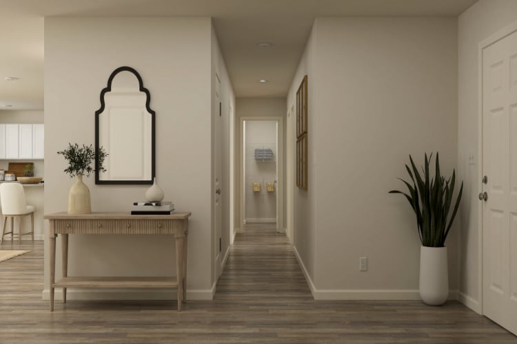 A room with a table and chairs.