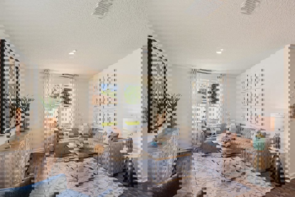 A living room with a couch and a coffee table.