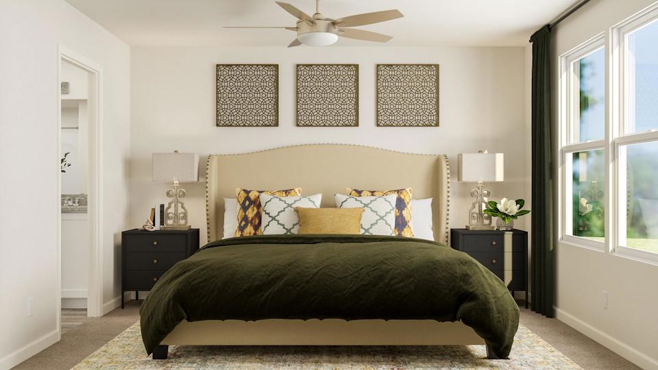 A bedroom with a large bed.