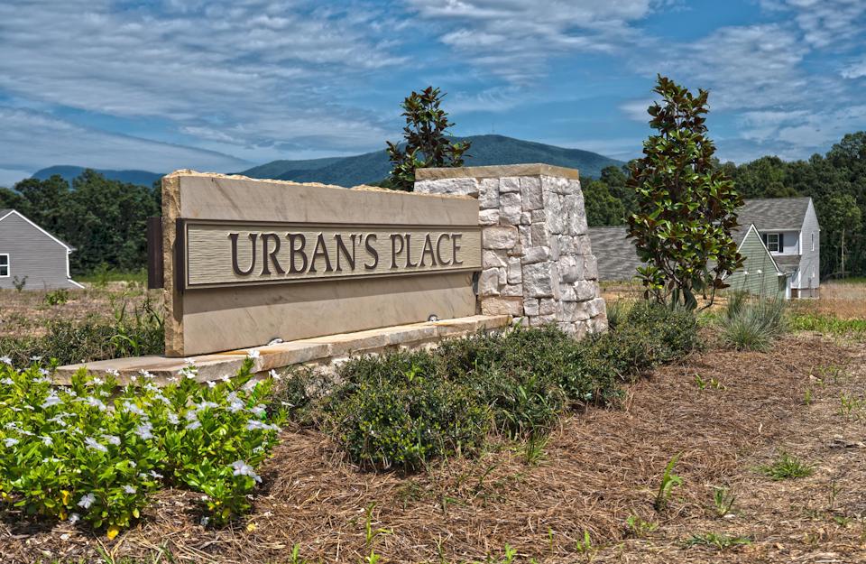 A sign in a garden.