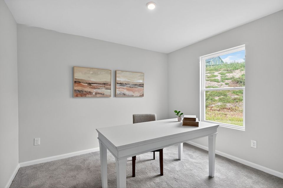 A white table in a room.
